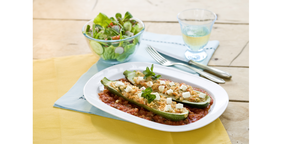 Zucchine con ripieno di noci e riso